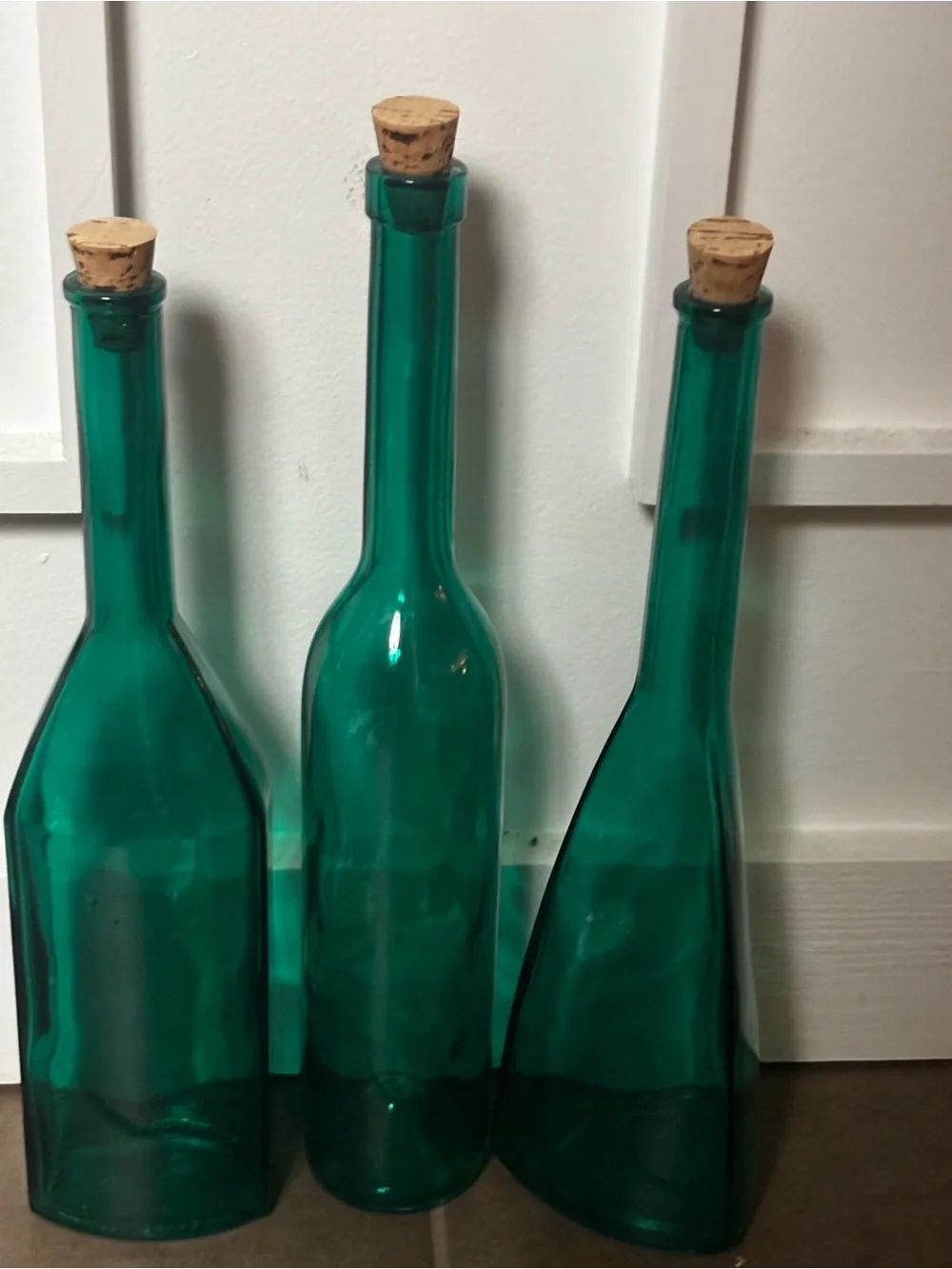 English Georgian green blown glass bottle-shape decanters set of 3